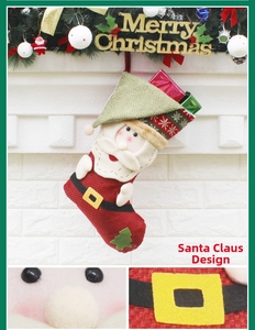 Detail of Santa Claus Christmas stocking with red nose and buckle on burlap fabric