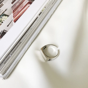Vintage S925 sterling silver open ring with engraved cross patterns on a white background