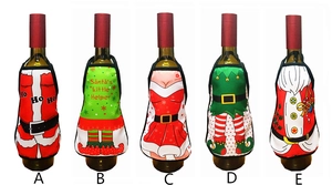 Detail of five festive Christmas apron wine bottle covers with Santa and elf designs