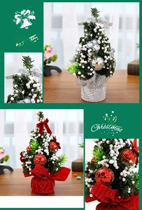 Detail of a 20cm mini Christmas tree with festive ornaments and colorful fabric base