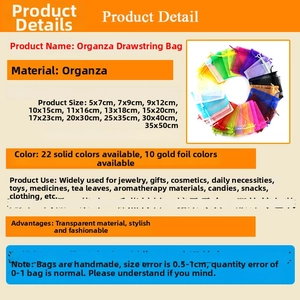 Detail showing various sizes and colors of snowflake organza drawstring gift bags