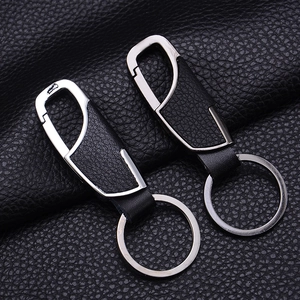 Two-piece set of silver zinc alloy car keychains with premium black lychee leather inlay