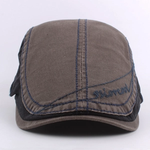 Retro cotton newsboy cap for men featuring contrast brown black panels and blue embroidery