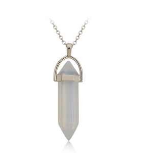 Macro shot of opal quartz hexagonal point pendant with silver metal chain necklace