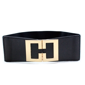 Women's black elastic wide waist belt featuring a geometric gold metal buckle on white background