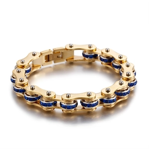 Gold motorcycle chain bracelet for men with blue zircon inlay on white background