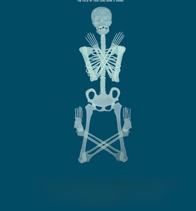 Detail of 360-degree rotating joints on a glowing Halloween plastic skeleton frame