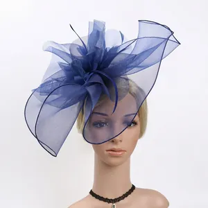 Elegant navy blue fascinator hat with layered mesh and feather detail for party