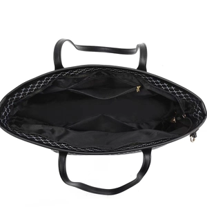 Top view showing the spacious black tote bag interior with zipper pocket and compartments