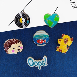 Set of six colorful cartoon enamel pins featuring gramophone, hedgehog and earth motifs