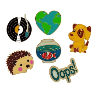 Set of 6 colorful enamel lapel pins featuring record player, globe, and animals