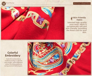 Detail of red pure wool shawl with intricate colorful paisley embroidery and soft texture