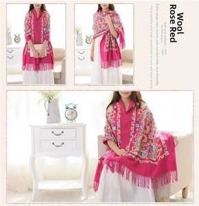 Detailed embroidery of rose red wool shawl with paisley patterns and tassels