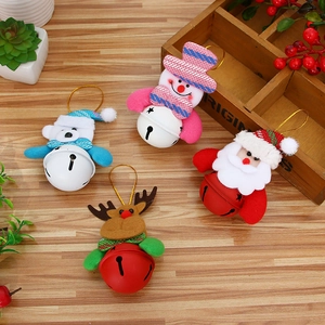 Set of 4 Christmas tree ornaments with Santa, snowman, bear, and reindeer metal bells