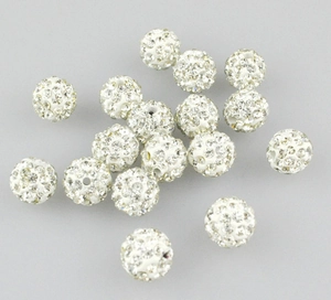 White rhinestone clay pave shamballa beads detail close up view for diy jewelry making.