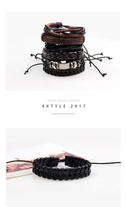 Detail of multi-layer men's braided leather bracelet set with vintage metal charms