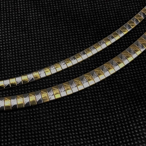 Polished two-tone 4mm wavy sand link necklace in gold and silver stainless steel