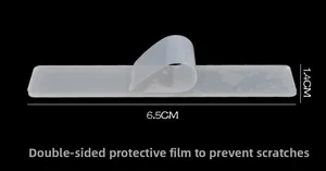 Macro view of clear acrylic nail display strip with protective film, 6.5cm x 1.4cm size