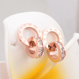 Rose gold double ring stud earrings with Roman numerals and shimmering cubic zirconia stones