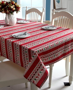 Festive Christmas rectangular tablecloth featuring red deer and green tree patterns