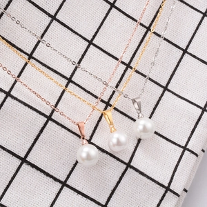 Three-color minimalist pearl pendant necklaces in rose gold, gold, and silver finishes