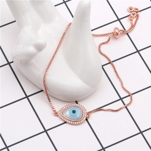 Detail of evil eye water drop bracelet with rose gold box chain and sliding clasp