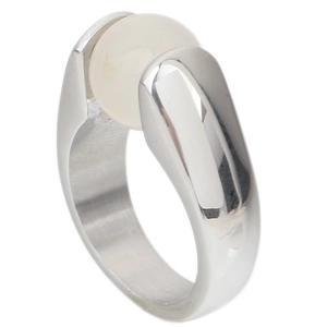 Detail view of wide silver steel ring with white cat eye stone in polished finish
