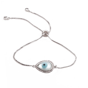 Silver adjustable evil eye bracelet with blue shell eye and cubic zirconia pavé