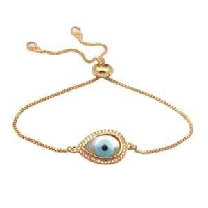 Gold evil eye droplet bracelet with white zircon and adjustable box chain on white background