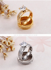 Macro detail of gold and silver stainless steel rings with round zircon micro-pave setting