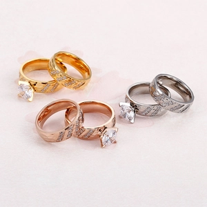 Three-color titanium steel ring set with 18k gold texture and sparkling zircon stones