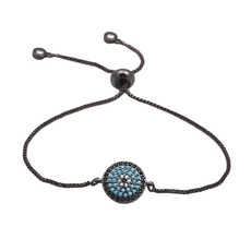 Detailed view of gunmetal evil eye bracelet with blue cubic zirconia and sliding clasp