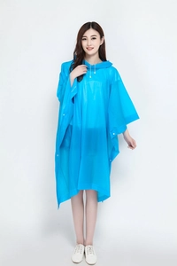 Detail of blue semi-transparent EVA rain poncho with drawstring hood and snap buttons