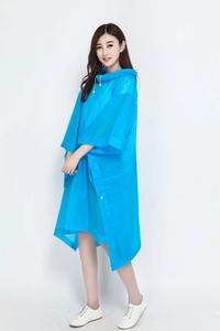 Detail of blue translucent hooded raincoat with white drawstrings and button closure