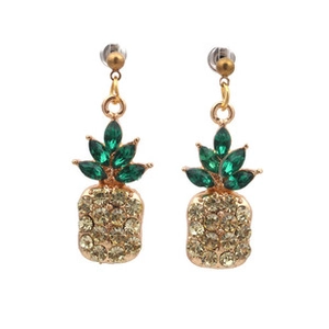 Detailed macro of pineapple earrings with green gems and champagne rhinestones