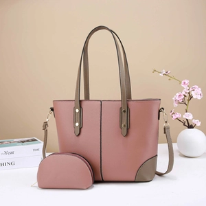 Chic lotus pink lychee leather tote bag with olive green accents and adjustable strap