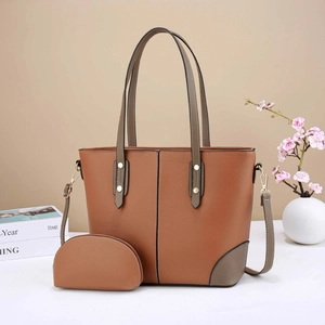 Brown faux leather tote bag set with matching small pouch and grey handles for women