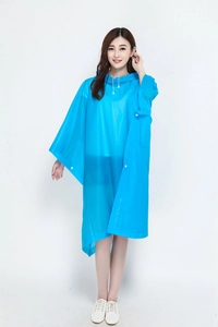 Close-up of waterproof blue cycling poncho with adjustable drawstring hood and side snap buttons