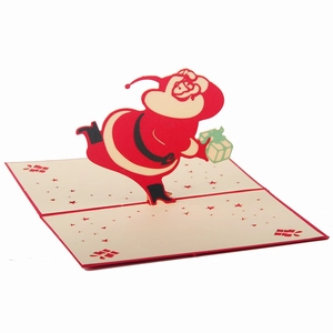 Detail of 3D pop-up Christmas card featuring Santa Claus running with gifts