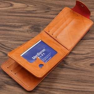 Men's vintage brown leather bifold wallet with multi-card slots and secure snap closure