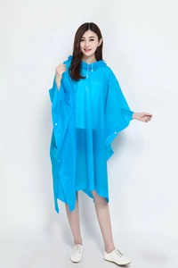 Detail view of the blue hooded raincoat with white drawstrings and side snap buttons