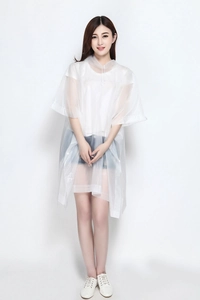 Detail of transparent hooded EVA rain poncho with adjustable drawstring and snap buttons