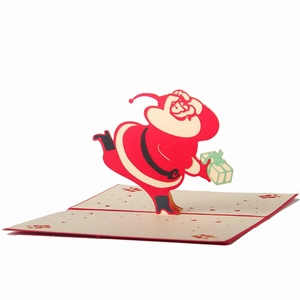 3D pop-up Christmas card featuring Santa Claus and gifts made of premium paper