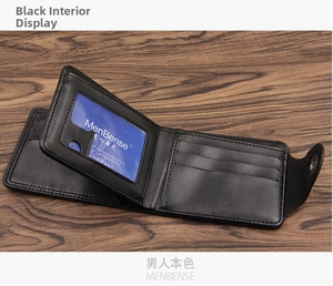 Detail view of black men's wallet with multiple card slots and secure snap closure