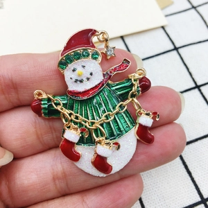 Exquisite Christmas snowman brooch with red hat and green striped shirt in enamel metal