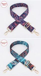 Close-up of ethnic paisley embroidered bag straps with golden lobster clasps and buckles