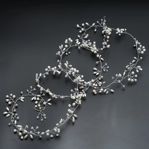 Detailed view of 1.5M bridal hair vine with handmade white pearls and crystals on silver wire