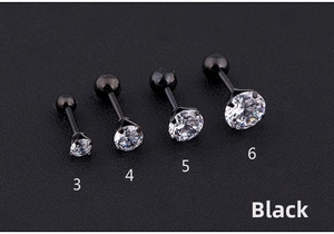 Detail view of 4-piece black titanium steel stud earrings set with 3mm to 6mm zircon stones