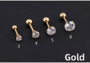 Detail view of 3-6mm gold titanium steel stud earrings with cubic zirconia stones