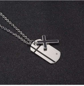 Cross and dog tag double pendant necklace in silver and black metal with rhinestone